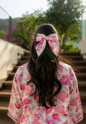 Romantic and feminine, this blush pink floral bow is perfect for dreamy hair days. Lightweight & pretty, ideal for summer looks. Ships in 2–4 days.