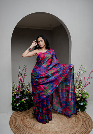 Model wearing Back from Vacay Saree, a digitally printed Kota Silk saree with handcrafted appliqué flowers, styled elegantly for a festive look.