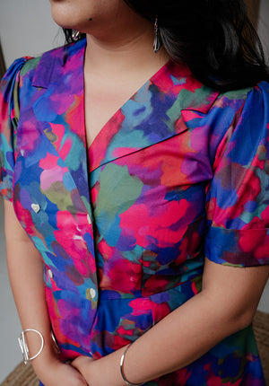 Close-up of the button-down closure and notch collar detail on the Back from Vacay Dress