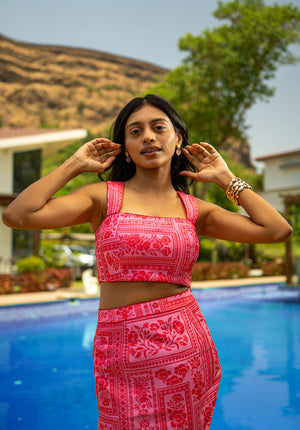 in a printed crop top with a square neckline — structured and chic