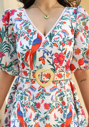 Close-up of floral print and belt detail on June dress