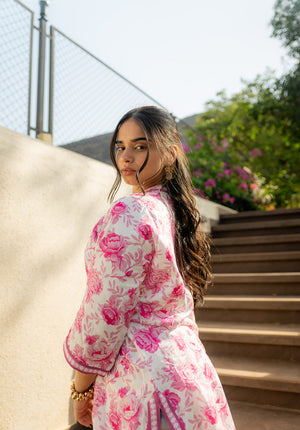 Side view of kurta emphasizing floral print and sleeve design.