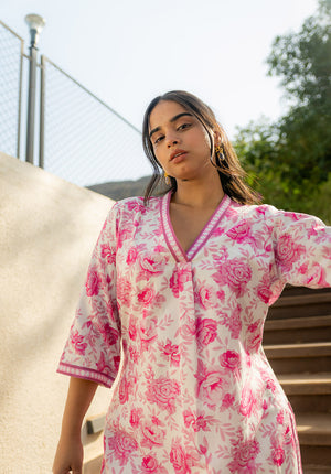 Close-up of kurta showing V neckline and delicate floral print for a refined ethnic look.