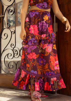 Model wearing layered skirt with soft gathers — flowy texture with a modern finish.