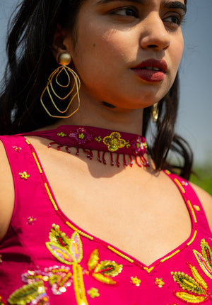 Curved V-neck blouse paired with matching dupatta highlighting the neckline in an elegant ethnic style.