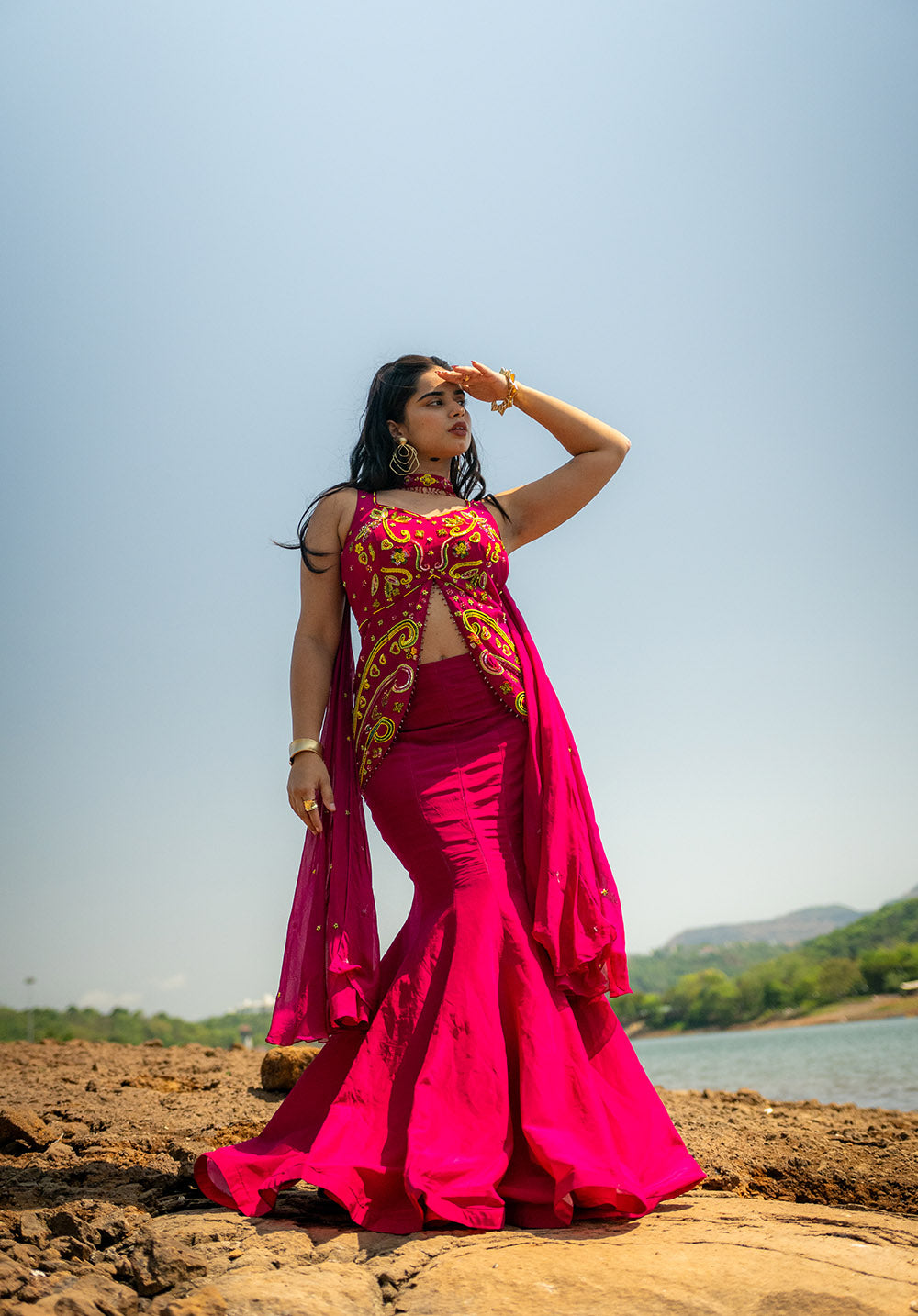 Elegant lehenga set with a fish-cut silhouette skirt styled with matching blouse and dupatta for a modern ethnic look.