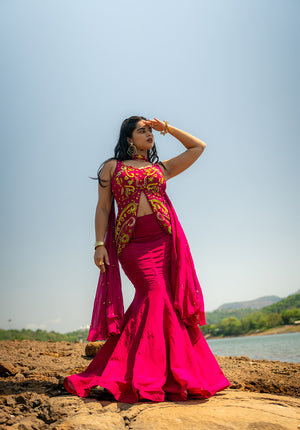 Elegant lehenga set with a fish-cut silhouette skirt styled with matching blouse and dupatta for a modern ethnic look.