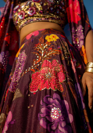 Creative embellishments and detailed floral print on lehenga skirt for a refined ethnic statement.