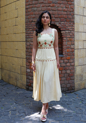 Full front view of Marigold sleeveless embroidered midi dress