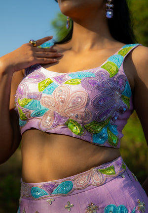 Close-up of sleeveless blouse with round neckline — elegant and minimal.