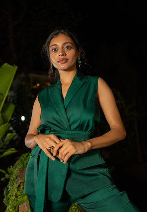 Close-up of a sleeveless green jacket showing collar detail