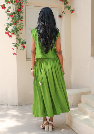 Back view of the Olive Bloom coord set featuring a meadow green gathered skirt and floral motif crop top from Arcadian Dream SS’26.