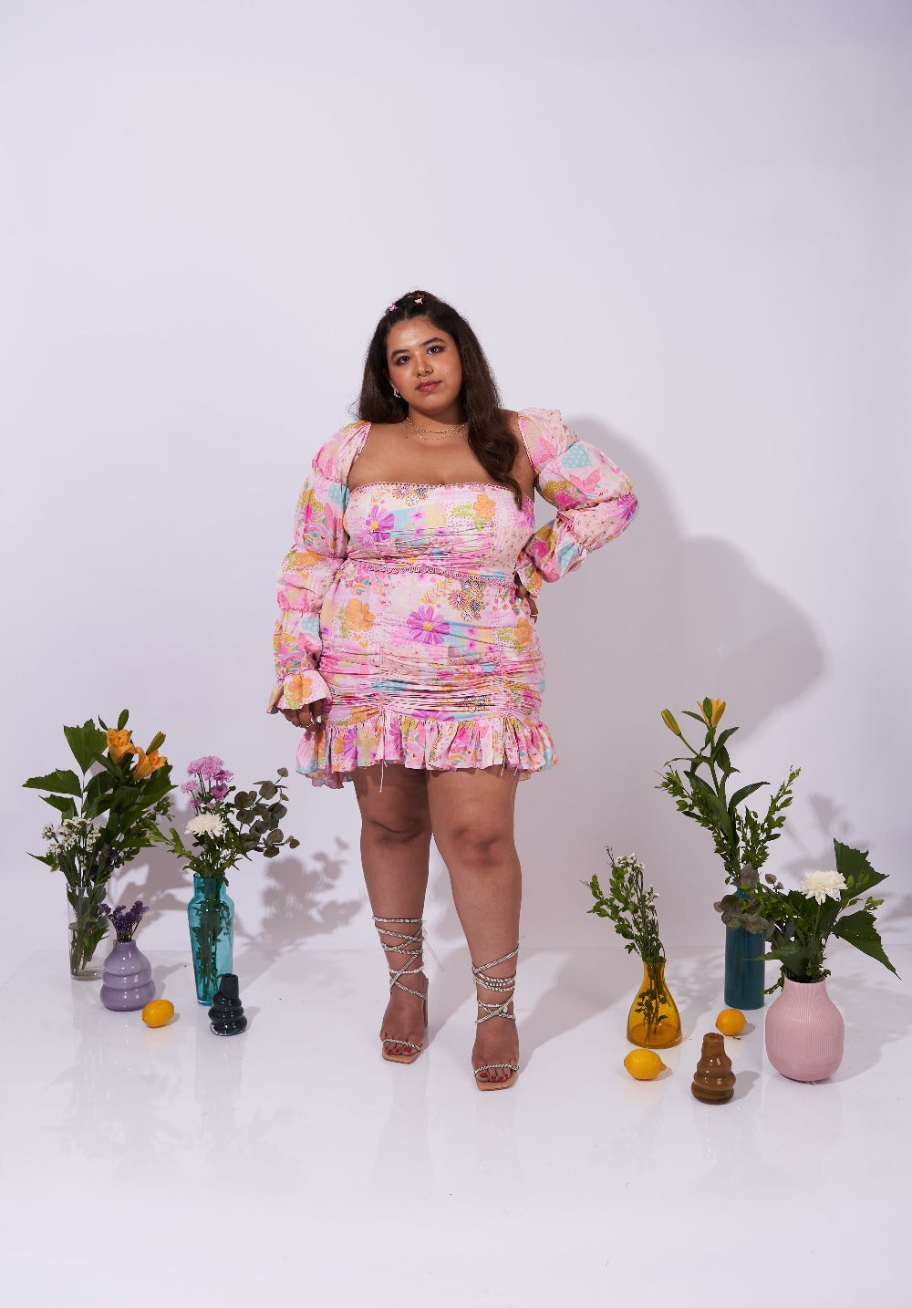 Model wearing the Allora Top with the matching ruffled skirt, styled for a chic, feminine aesthetic.