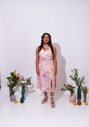 Front view of the Allora Dress – Floral A-line dress with crisscross straps
