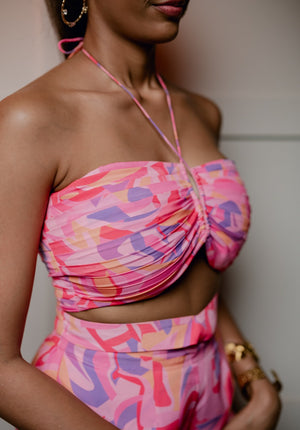 Brunch-ready coord set featuring a high-waisted straight pant and a pleated crop top.