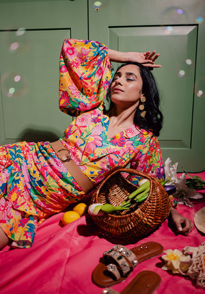 Vibrant floral midi dress with a draped silhouette, perfect for beach vacations, tropical getaways, and summer brunches – Ur•Mish

