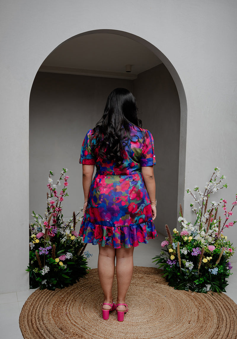 Back view of the Back from Vacay Dress – highlighting the flowy cotton fabric and elegant fit