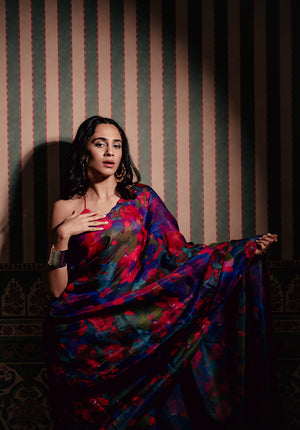 Model wearing Back from Vacay Saree, a digitally printed Kota Silk saree with handcrafted appliqué flowers, styled elegantly for a festive look.