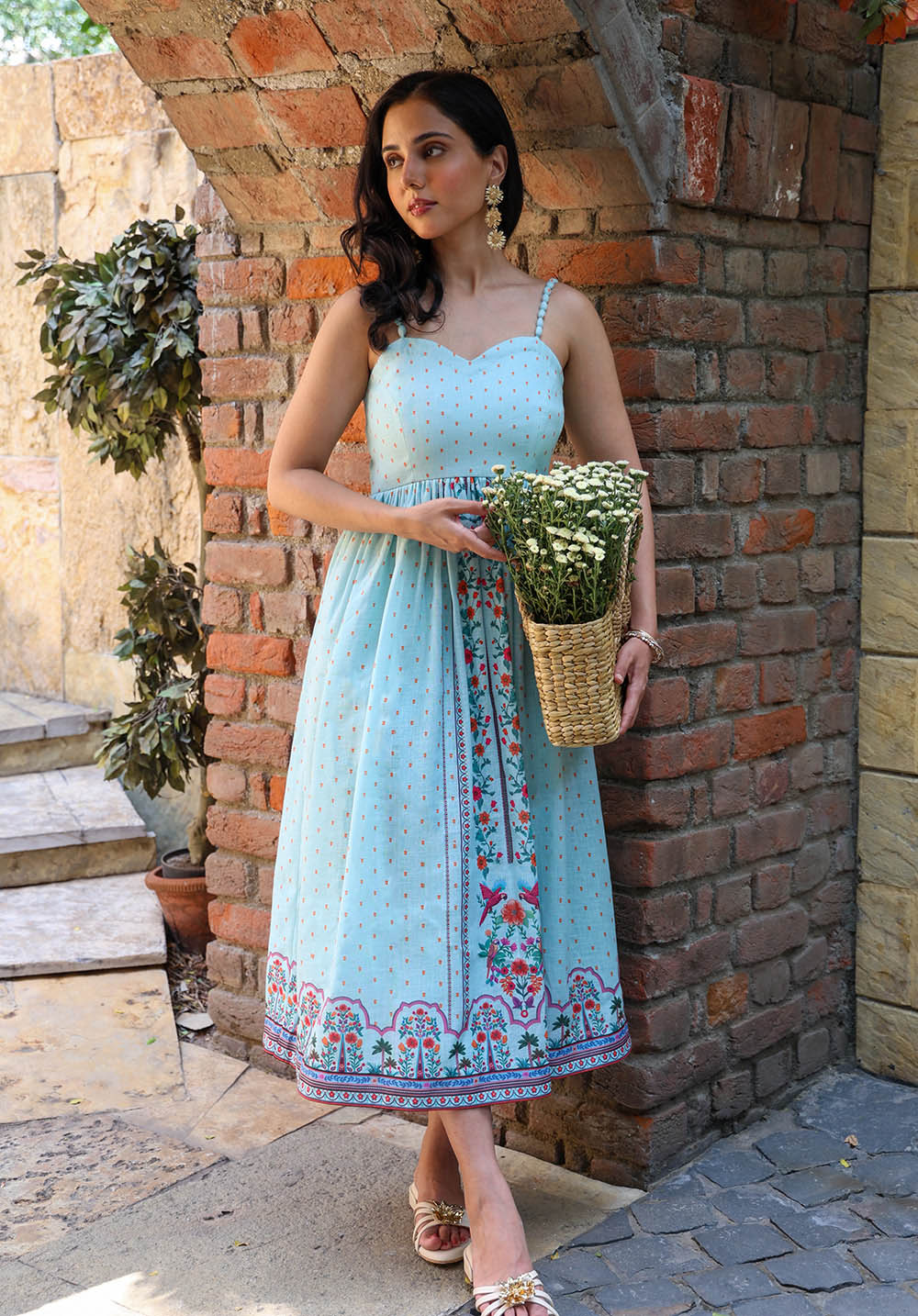 Portrait view of Birdsong blue floral maxi dress