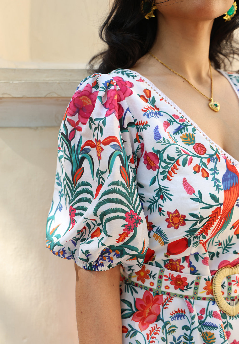 Side close-up view of June printed mini dress with puff sleeves