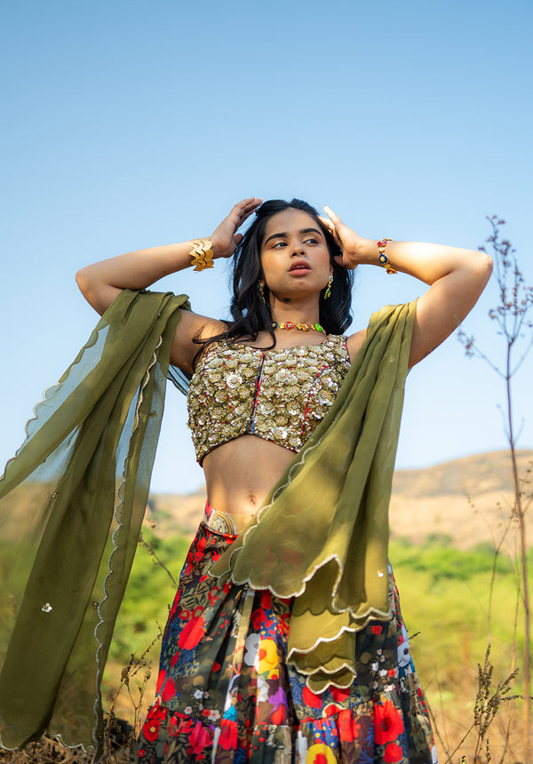 Model wearing blouse, skirt, and dupatta in a standing pose — elegant lehenga set