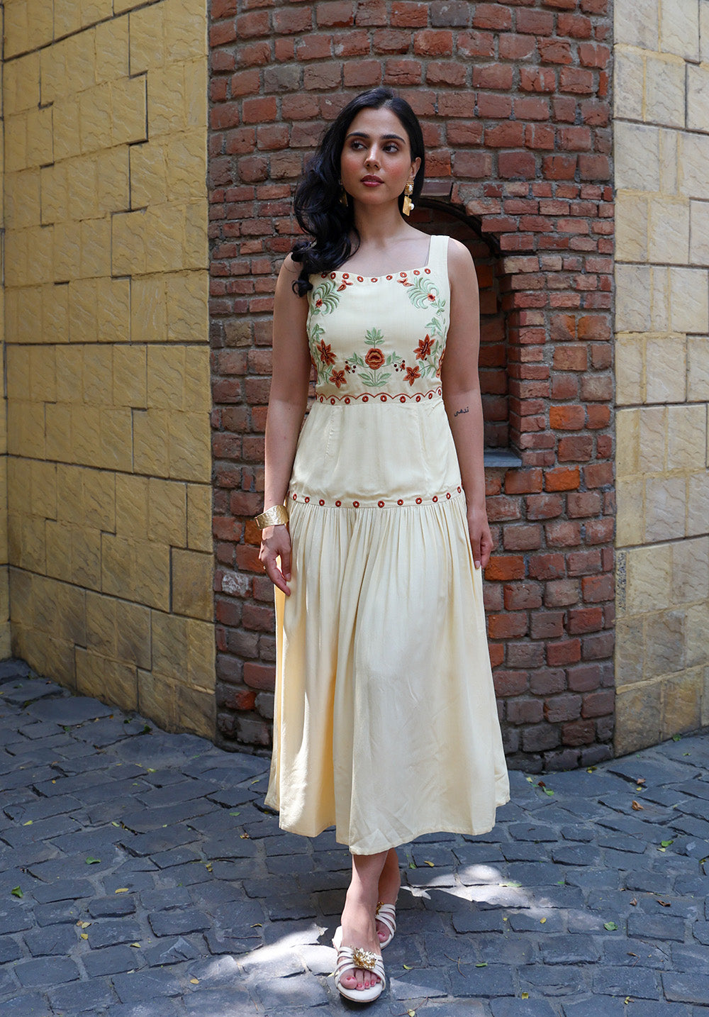 Full front view of Marigold sleeveless embroidered midi dress