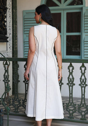 Back view of ivory Parasio midi dress with structured panel detailing
