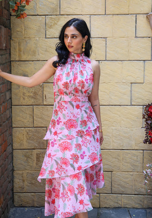 Model posing in Secret Garden floral midi dress