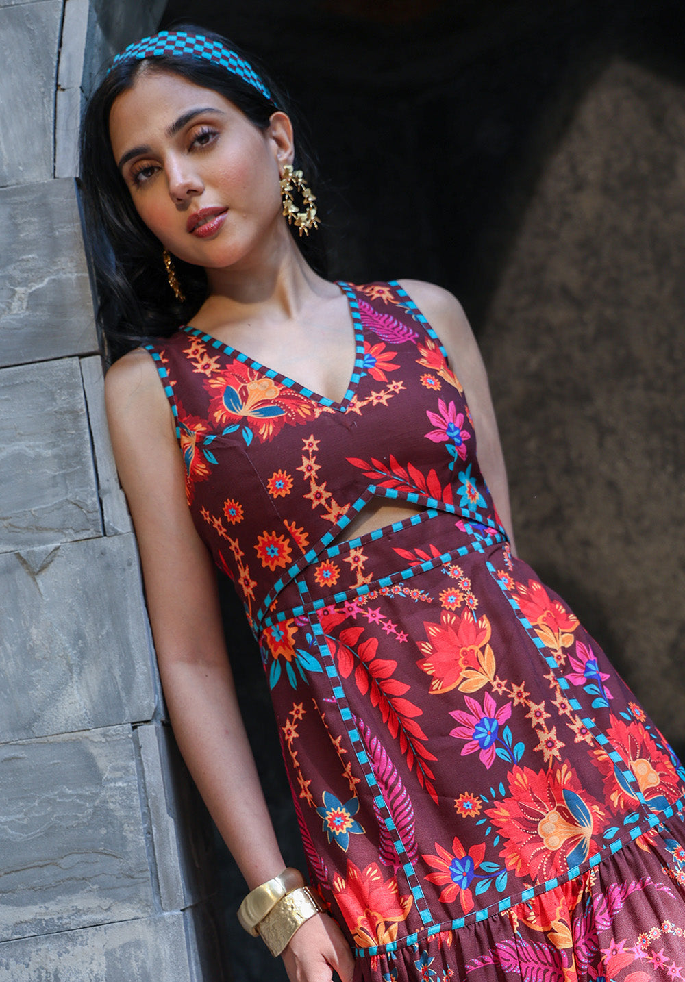Model posing in Serena dark floral dress
